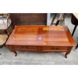 A MODERN HARDWOOD COFFEE TABLE ENCLOSING TWO DRAWERS, 47" X 23"