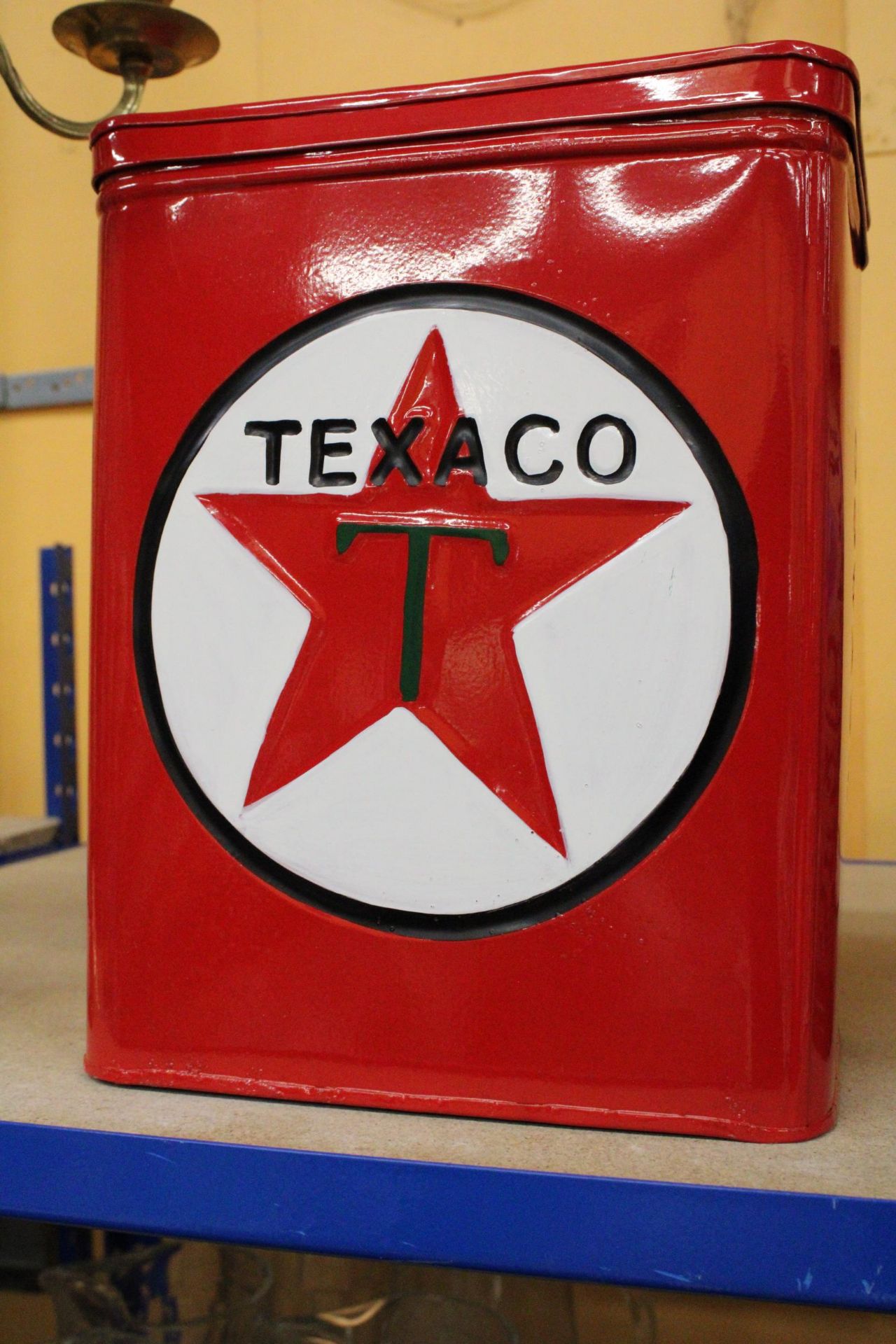 A RED 'TEXACO' STORAGE TIN