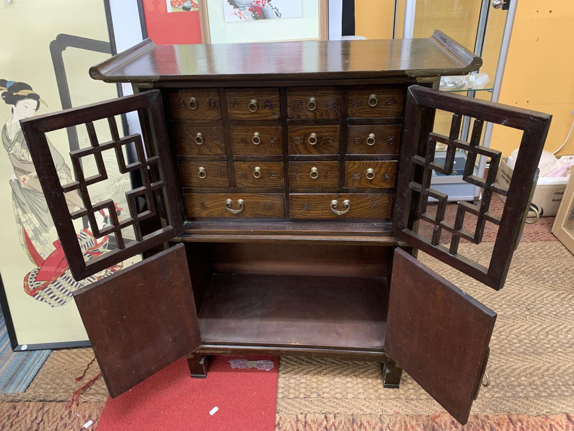 A KOREAN WOOD AND BRASS APOTHECARY CABINET, REVEALING 14 DRAWERS, STACKED ON A HINGED DOOR - Image 3 of 5