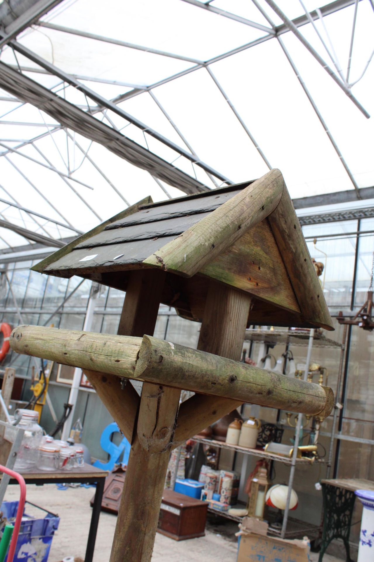 A WOODEN BIRD TABLE AND TWO LOG BIRD BOXES - Image 2 of 3