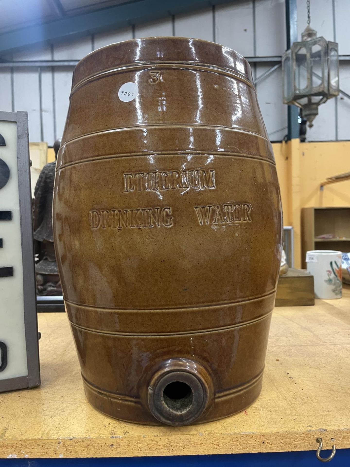 A VINTAGE ETHERIUM DRINKING WATER STONEWARE BARREL (A/F)