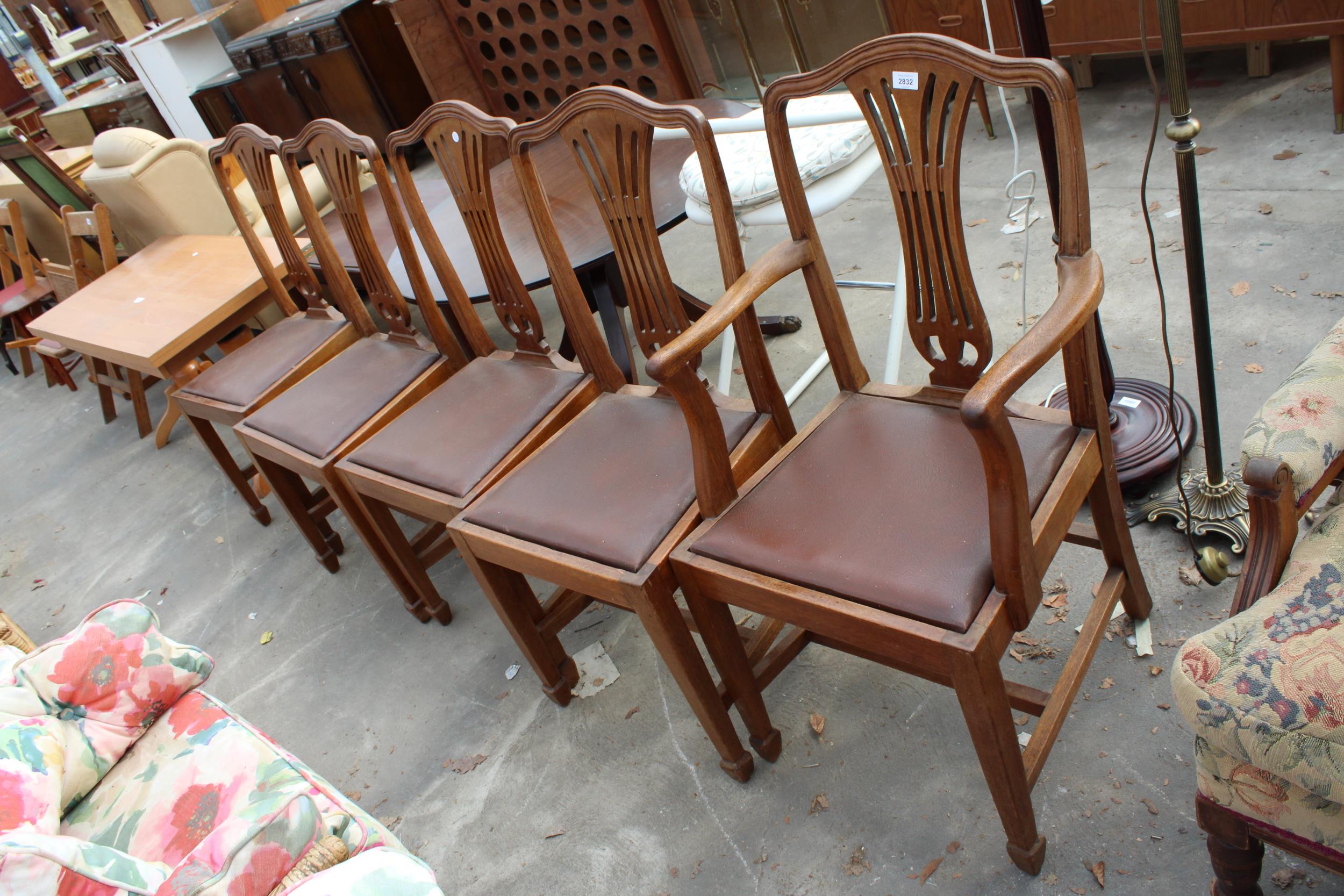 A SET OF FIVE MAHOGANY HEPPLEWHITE STYLE DINING CHAIRS, ONE BEING A CARVER