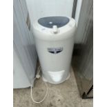 A SMALL WHITE KNIGHT SPIN DRYER