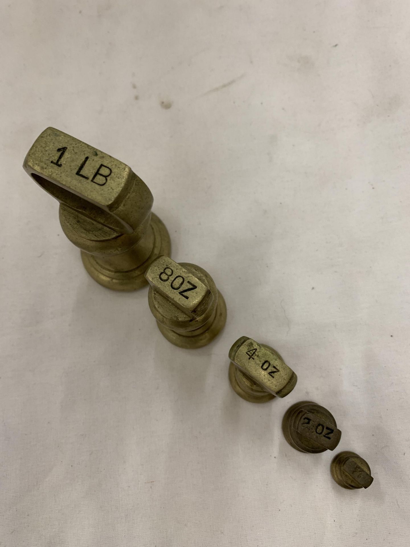 A SET OF 5 BRASS WEIGHTS - Image 2 of 3