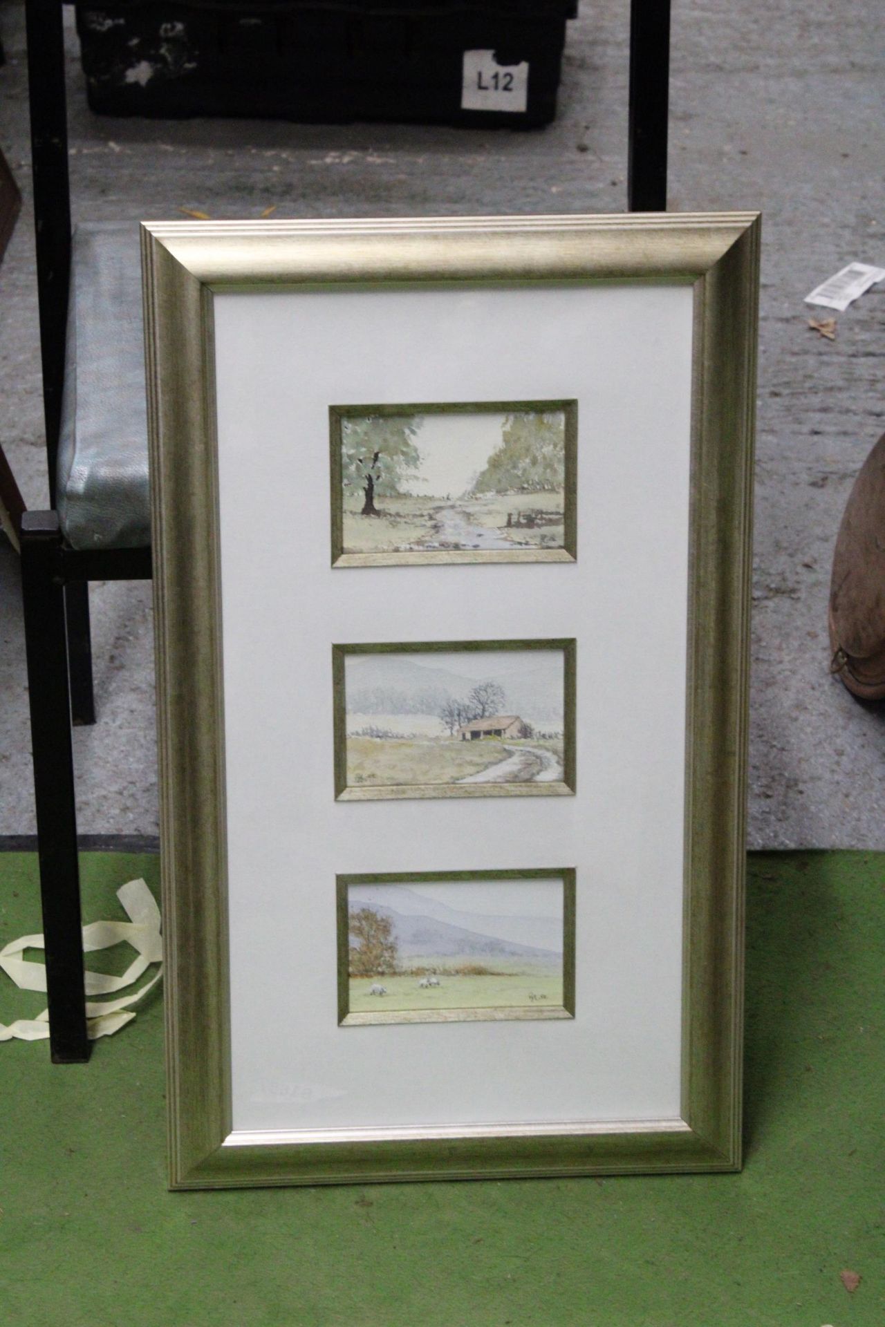 THREE WATERCOLOURS OF COUNTRY SCENES IN ONE FRAME, SIGNED BRIAN LEE