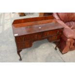 A MID 20TH CENTURY WALNUT KNEEHOLE DRESSING TABLE BASE ON CABRIOLE LEGS, 42" WIDE