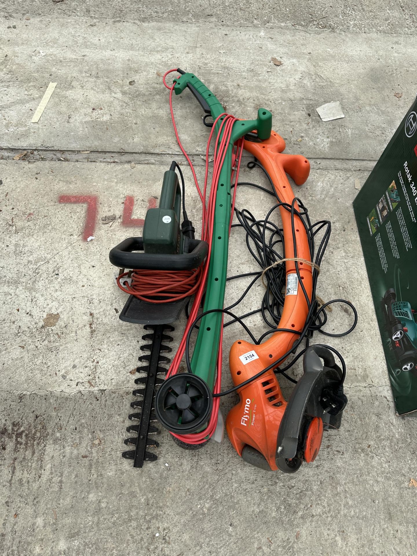 AN ELECTRIC STRIMMER, LAWN EDGER AND HEDGE TRIMMER