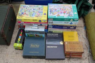 A LARGE ASSORTMENT OF JIGSAW PUZZLES AND BOARD GAMES TO INCLUDE MAHJONG ETC
