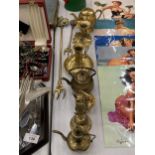 A COLLECTION OF BRASS ITEMS TO INCLUDE KETTLES, BELLS, CANDLESTICKS, ETC.,