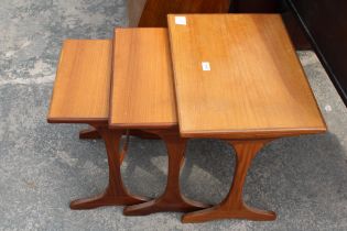 A RETRO TEAK NEST OF THREE G. PLAN TABLES