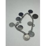 A SILVER CHARM BRACELET