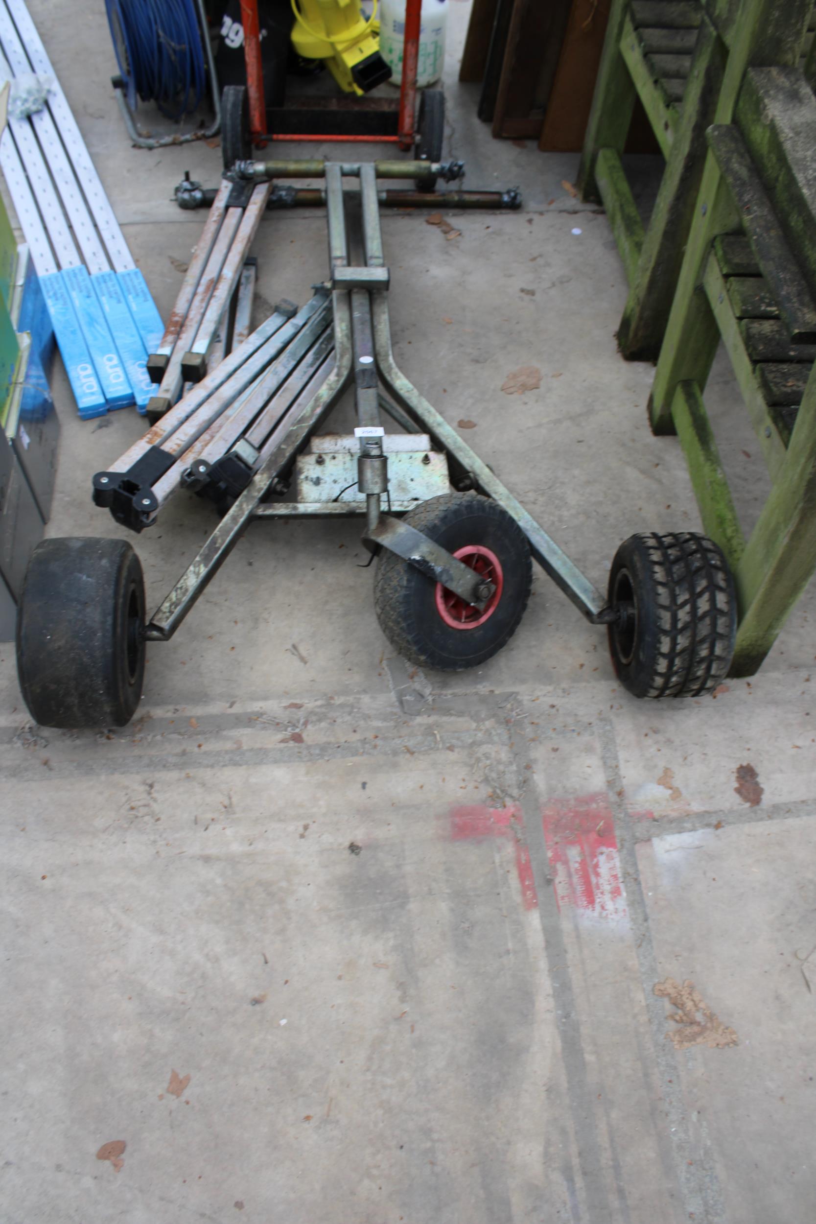 A METAL FOLDING DOLLY AND STANDS