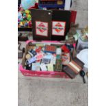 AN ASSORTMENT OF BOARD GAMES AND PLAYING CARDS