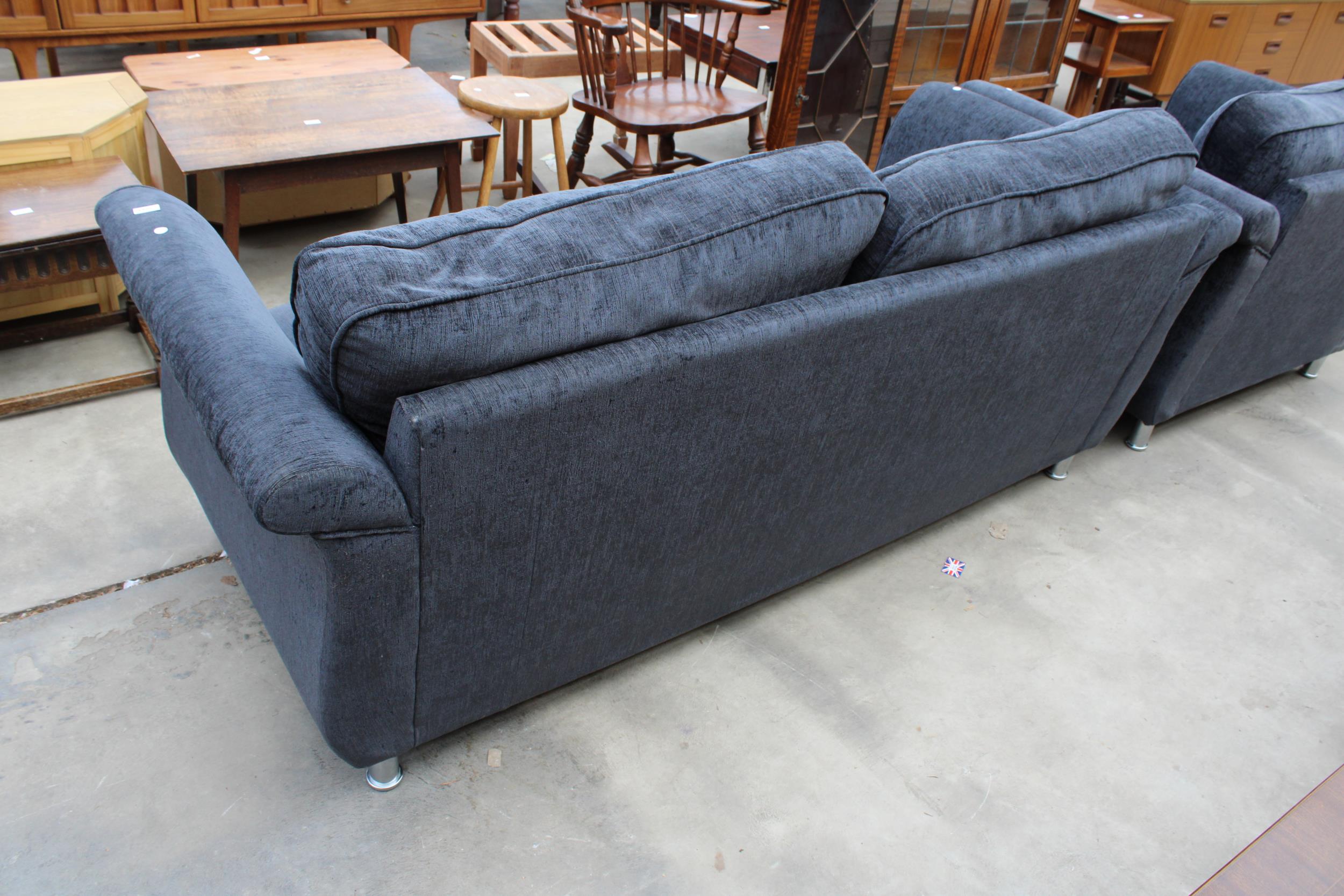 A MODERN SLATE GREY THREE SEATER SETTEE WITH POLISHED CHROME BUTTONED ARMS AND LEGS - Image 3 of 4