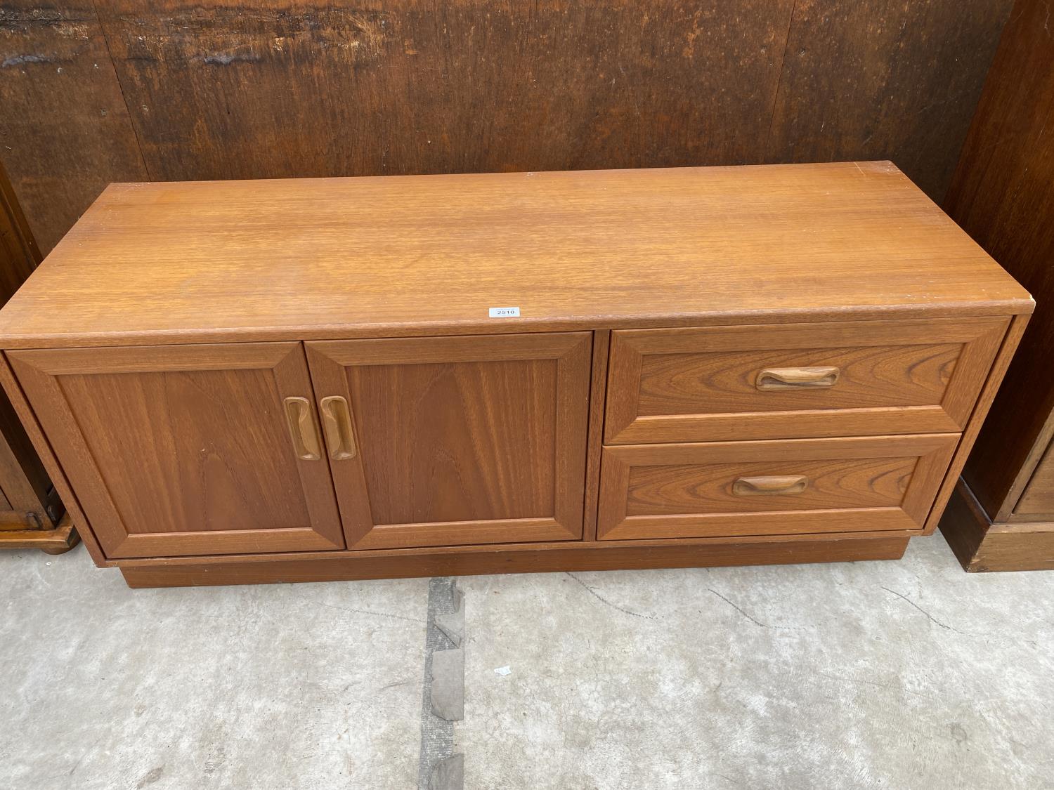 A RETRO TEAK G PLAN SIDEBOARD ENCLOSING TWO CUPBOARDS AND TWO DRAWERS, 52" WIDE