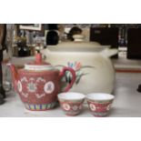 AN ORIENTAL TEAPOT AND TWO TEA CUPS, PLUS A LARGE LIDDED ORIENTAL POT