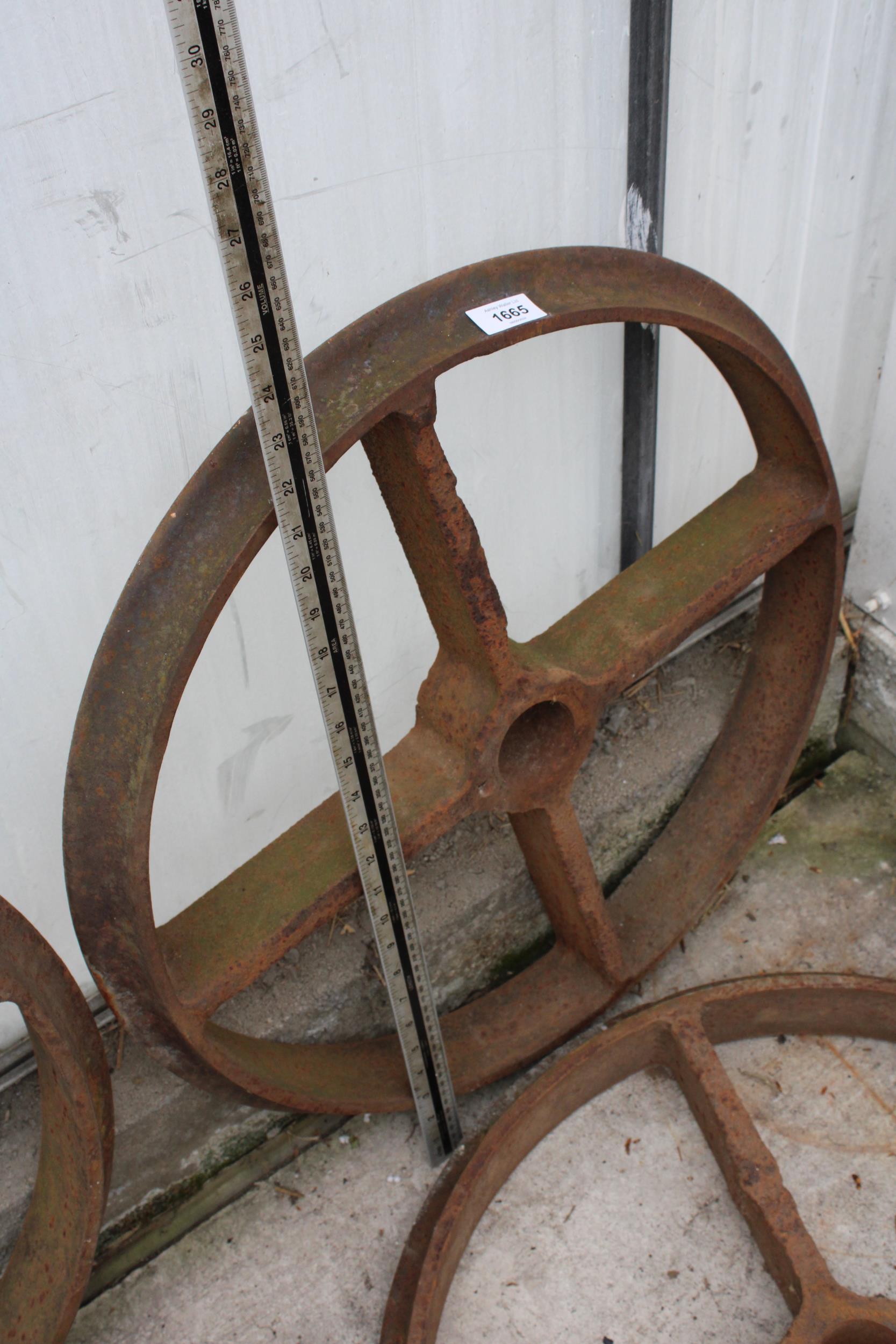 A PAIR OF VINTAGE CAST IRON TRAIN WHEELS - Image 2 of 2
