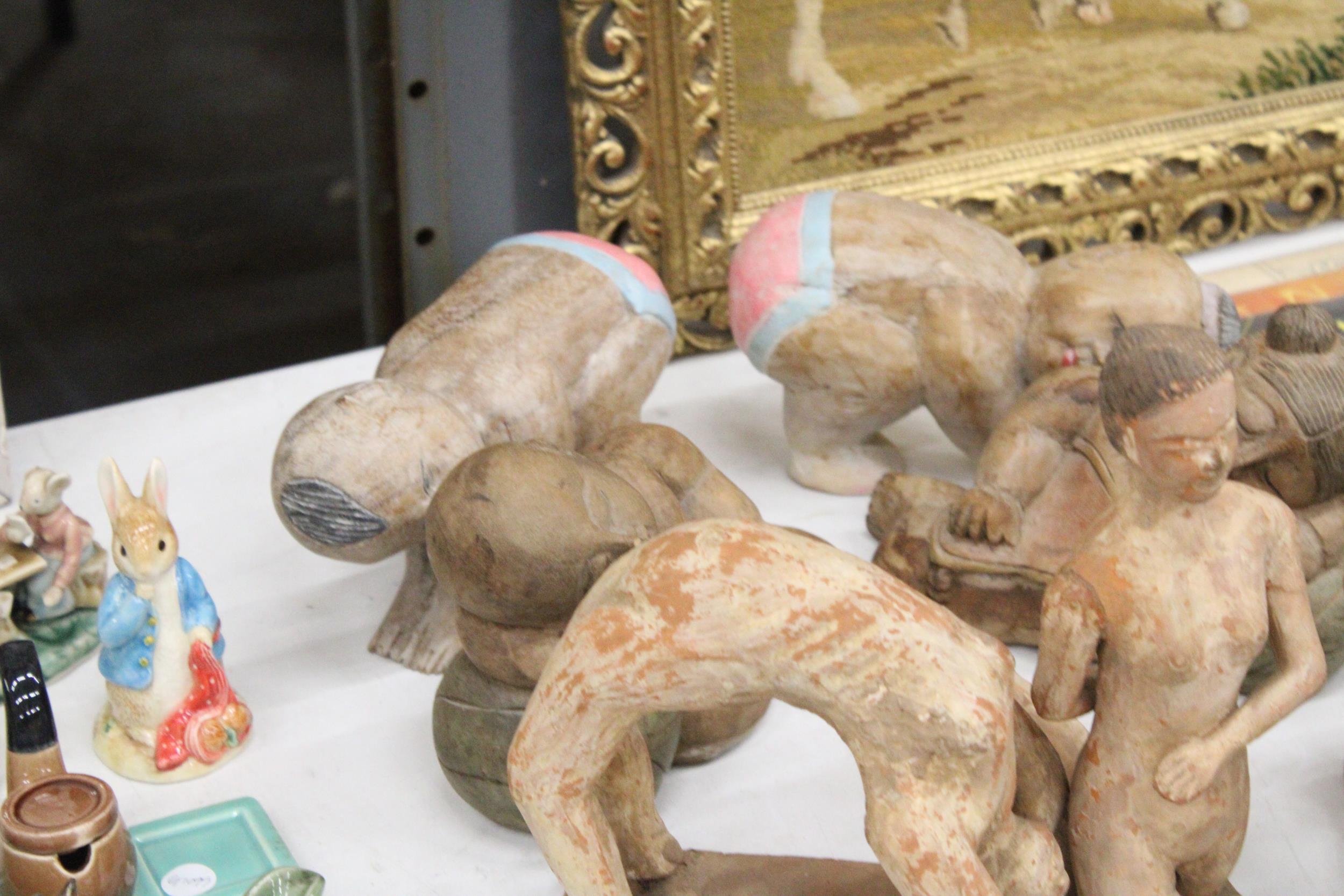 THREE LARGE CLAY MODELS OF GYMNASTS, PLUS FOUR WOODEN BABY BUDDAHS - Image 3 of 5