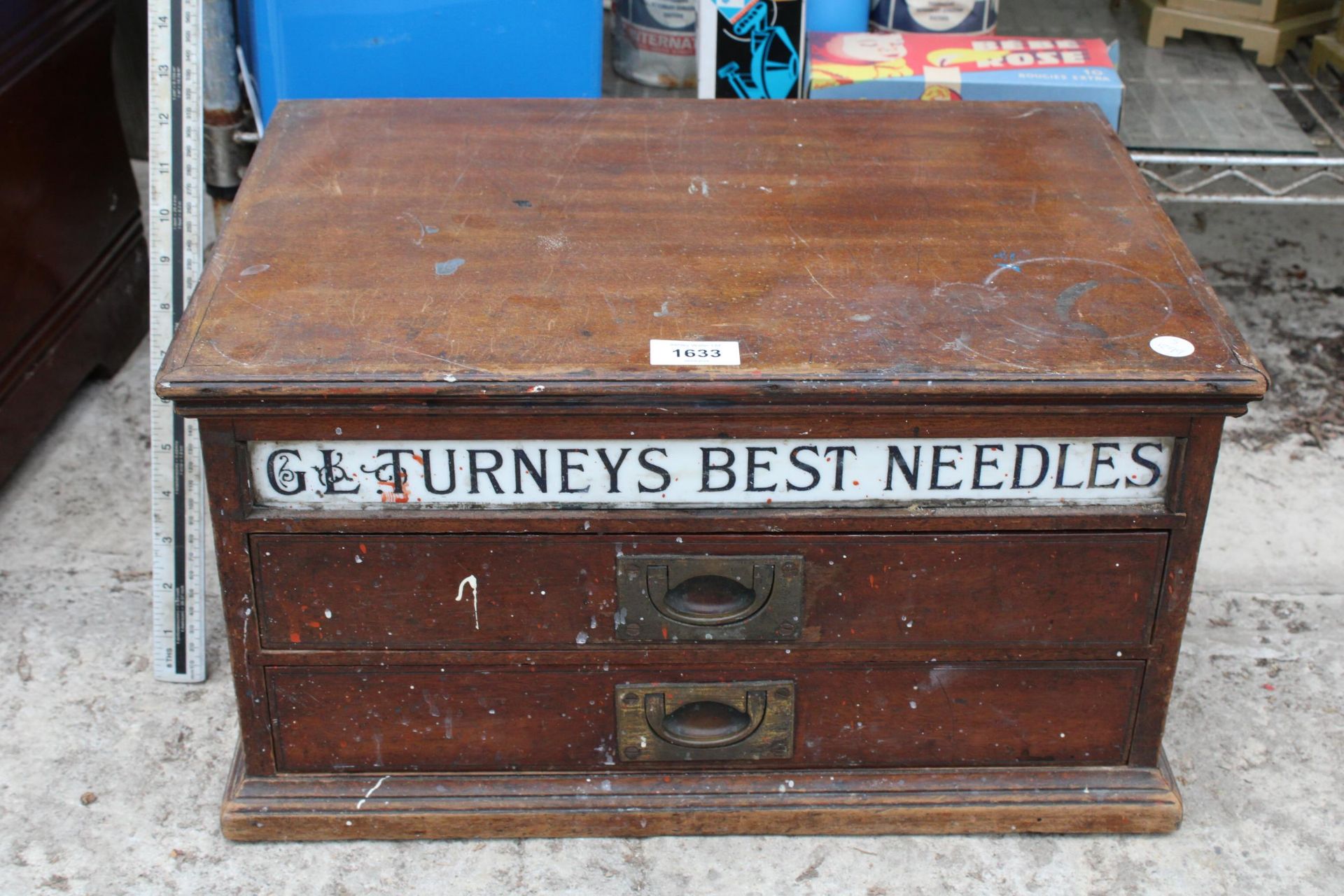A VINTAGE MAHOGANY TWO DRAWER SEWING CHEST BEARING THE LABEL G L TURNEYS BEST NEEDLES