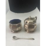 THREE HALLMARKED BIRMINGHAM SILVER ITEMS TO INCLUDE TWO CRUETS WITH BLUE GLASS LINERS AND A SPOON