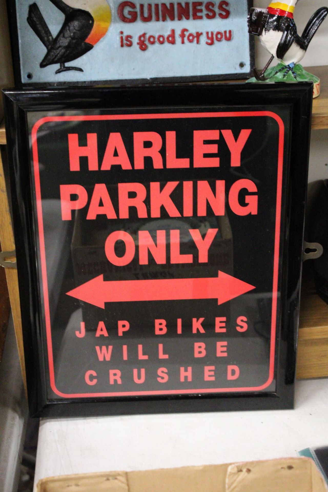 A 'HARLEY PARKING ONLY' SIGN, 32CM X 39CM