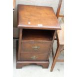 AN OAK ANTIQUE STYLE BEDSIDE CHEST