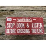 A VINTAGE METAL BR SIGN "STOP, LOOK & LISTEN BEFORE CROSSING THE LINE"