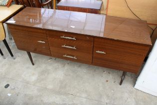 A RETRO SIDEBOARD ENCLOSING DRAWERS AND CUPBOARDS, 59" WIDE