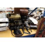 A LARGE COLLECTION OF VINTAGE CAMERAS AND ACCESSORIES TO INCLUDE, CANON EOS 1X, PENTAFLEX SL,