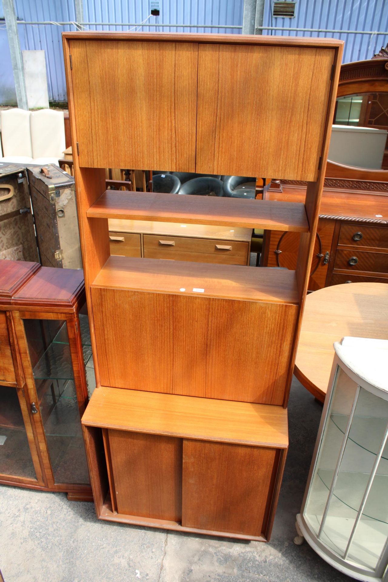 A RETRO TEAK G.PLAN BUREAU BOOKCASE WITH SLIDING DRAWERS TO BASE, 30" WIDE