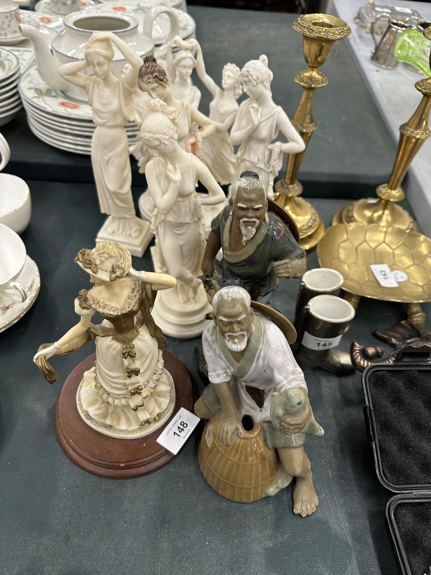 A COLLECTION OF EIGHT FIGURES TO INCLUDE GREEK STYLE ALABASTER AND MUD MEN