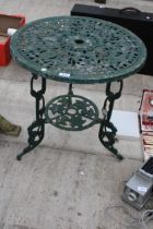 A GREEN PAINTED CAST ALLOY CIRCULAR TABLE