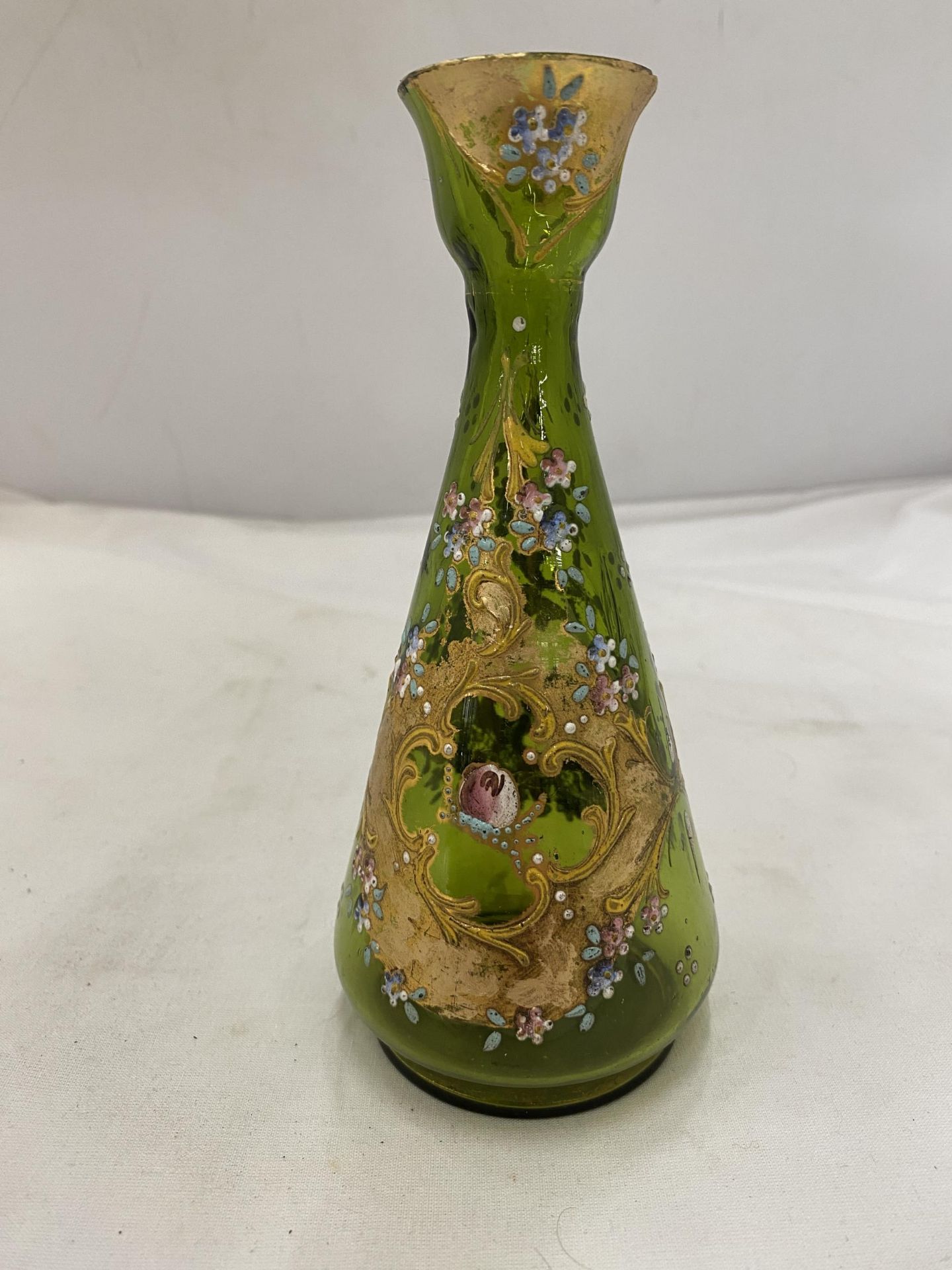 A GREEN STOURBRIDGE GILT GLASS VASE