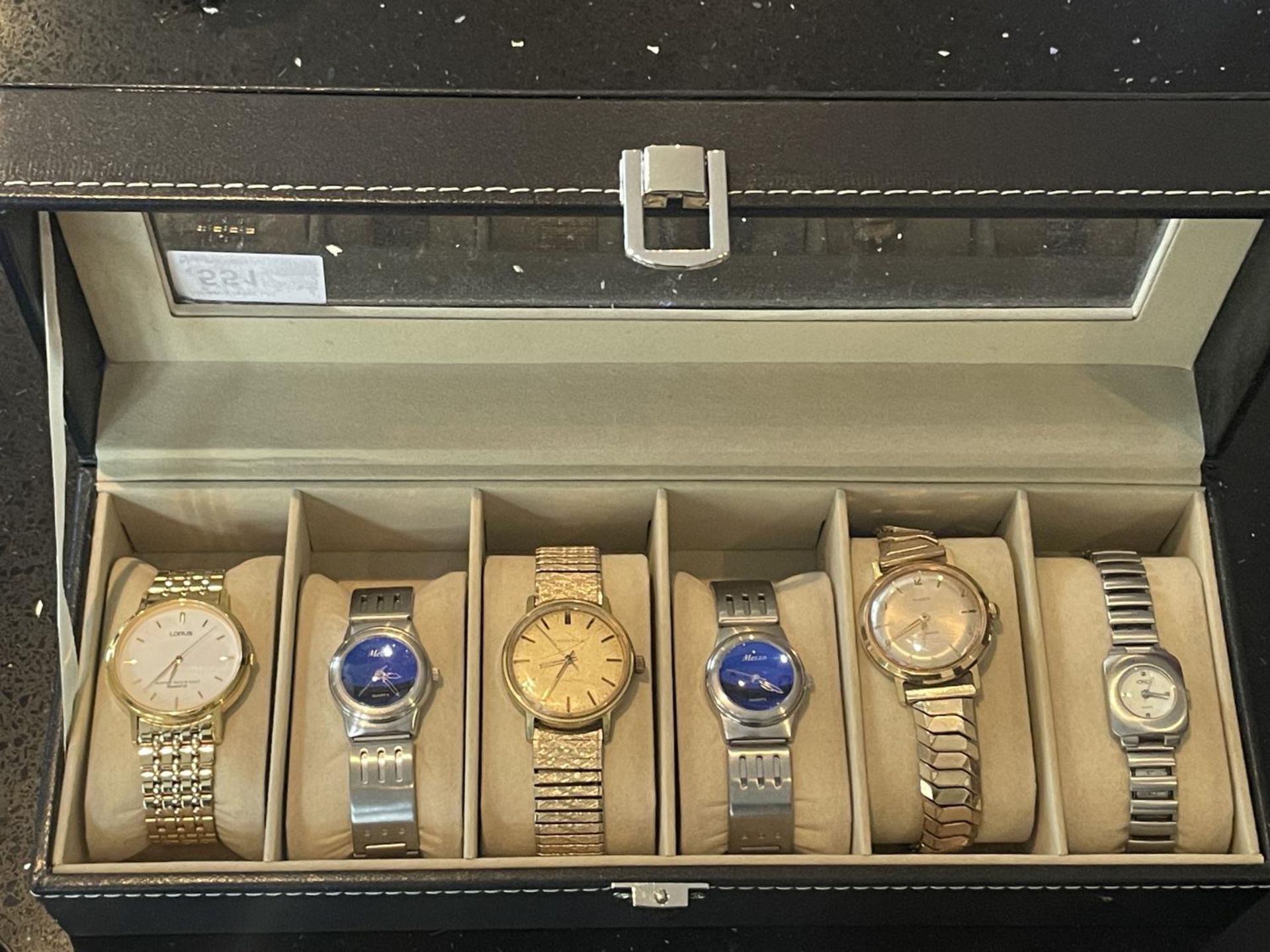 A SIX WATCH CASE AND CONTENTS