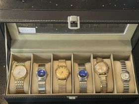 A SIX WATCH CASE AND CONTENTS