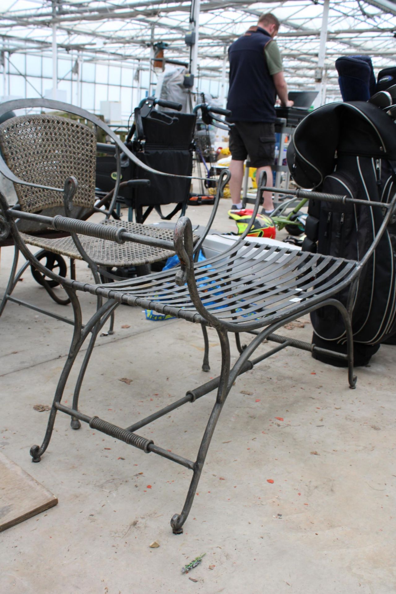 A METAL GARDEN CHAIR WITH RATTAN SEAT AND BACK AND A SIMILAR HEAVY METAL BENCH - Image 3 of 3