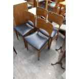 A SET OF FOUR RETRO BEAUTILITY DINING CHAIRS