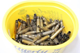 A QUANTITY OF BRASS BULLET CASES