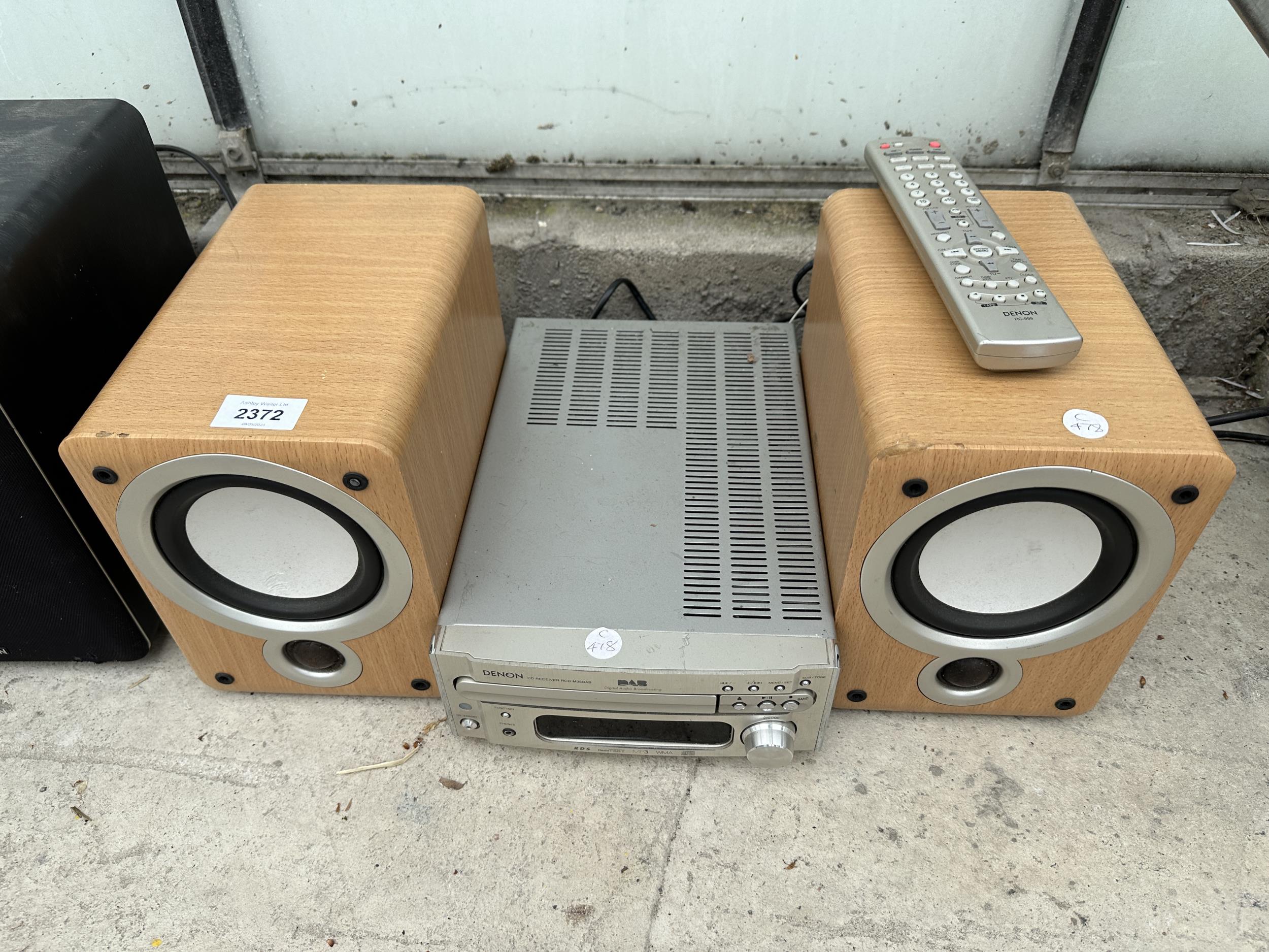 A DENON DAB RADIO WITH A PAIR OF SPEAKERS