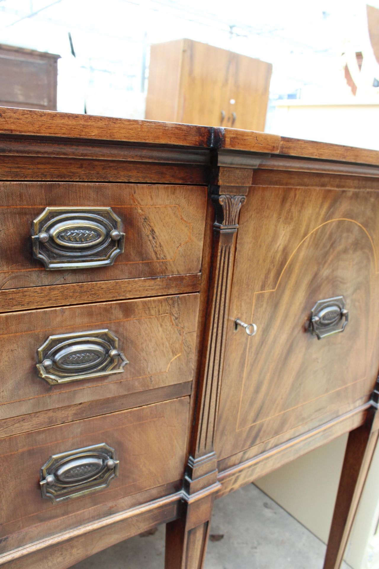 A REGENCY STYLE, MAHOGANY CROSSBANDED AND INLAID SIDEBOARD ON TAPERING LEGS, 63" WIDE - Image 8 of 8