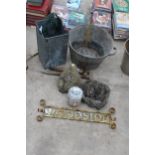 AN ASSORTMENT OF GARDEN ITEMS TO INCLUDE CONCRETE FIGURES, A TIN BATH AND A SIGN ETC
