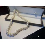 A STRING OF JIEBEI CULTURED PEARLS IN A PRESENTATION BOX