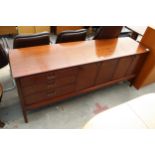 A RETRO BEITHCRAFT HARDWOOD SIDEBOARD ENCLOSING THREE DRAWERS AND FOUR CUPBOARDS, 72" WIDE