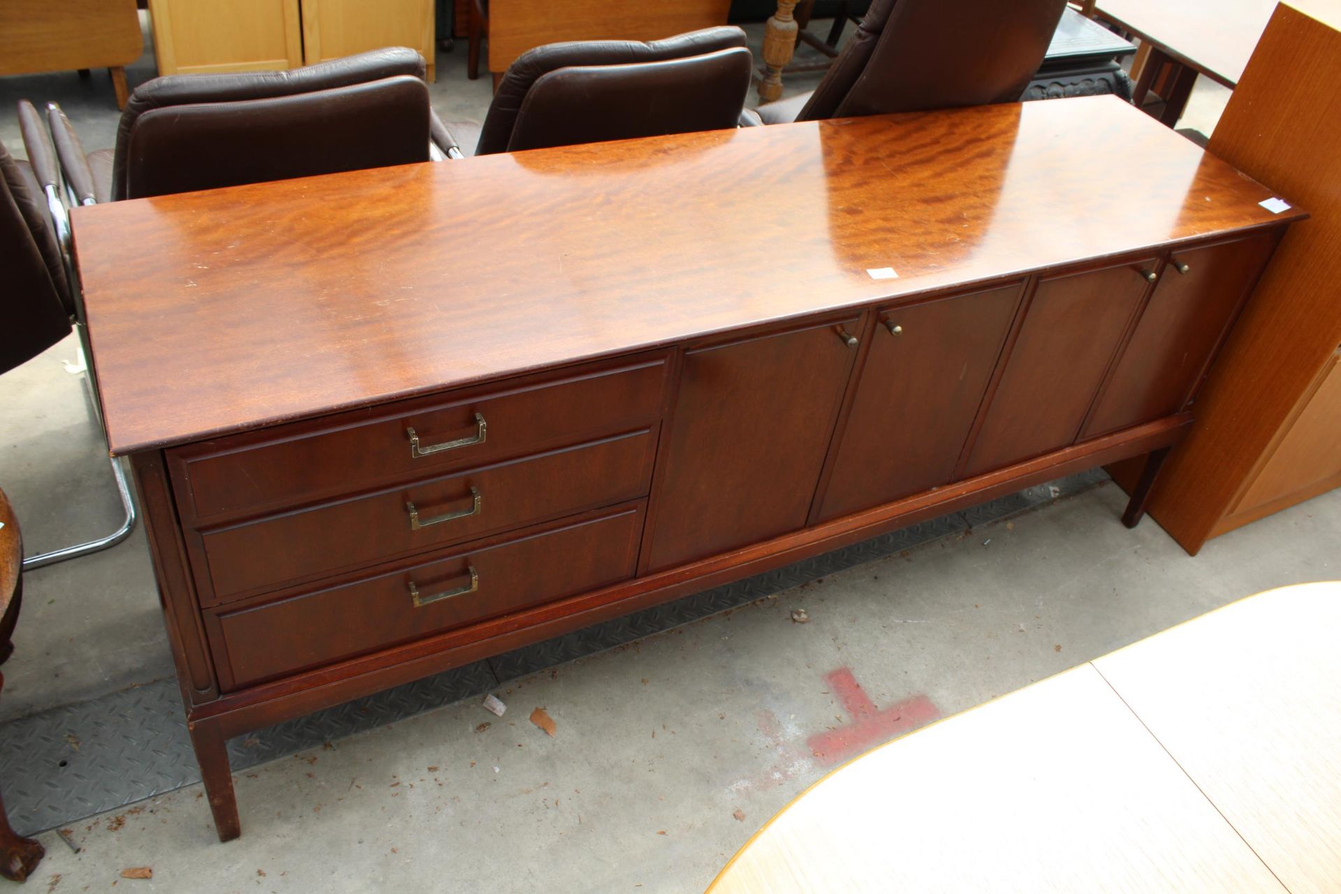 A RETRO BEITHCRAFT HARDWOOD SIDEBOARD ENCLOSING THREE DRAWERS AND FOUR CUPBOARDS, 72" WIDE
