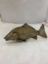 A VINTAGE BRASS FISH SHAPED NAPKIN HOLDER