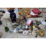 AN ASSORTMENT OF ITEMS TO INCLUDE CERAMIC VASES, FIGURES AND BOOKS ETC