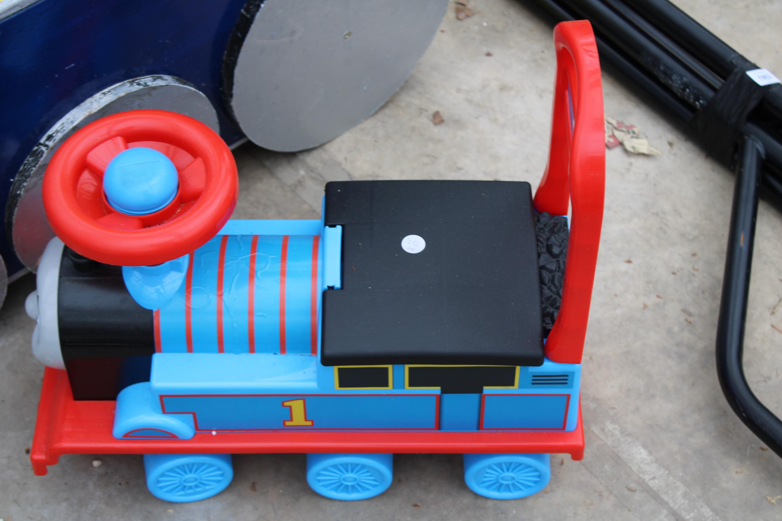 A RIDE ALONG THOMAS THE TANK ENGINE AND A WOODEN TRAIN STORAGE BOX - Image 2 of 3