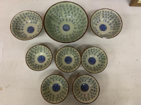 A SET OF CELADON BOWLS WITH CHINESE CHARACTERS AND LONGEVITY SYMBOL XUANDE MARK (ONE A.F)