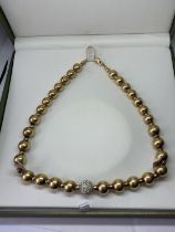 A 1980'S SILVER GILT SPHERE NECKLACE WITH DIAMANTE BALL IN A PRESENTATION BOX