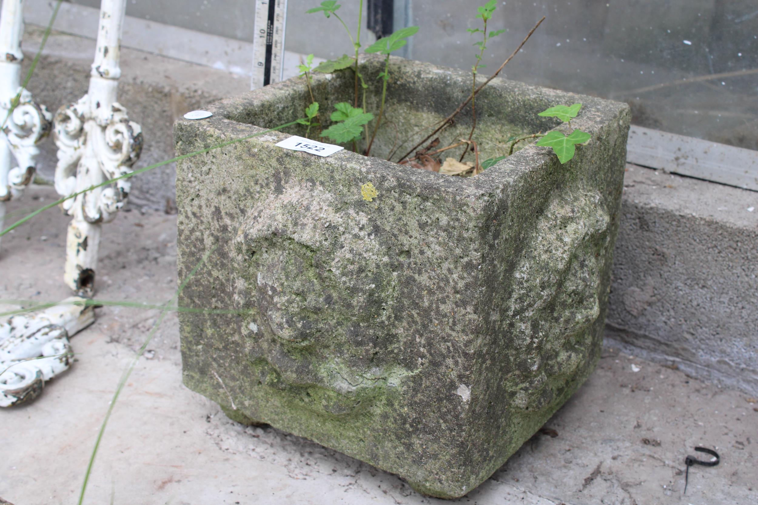 A SMALL RECONSTITUTED STONE PLANTER - Image 2 of 2